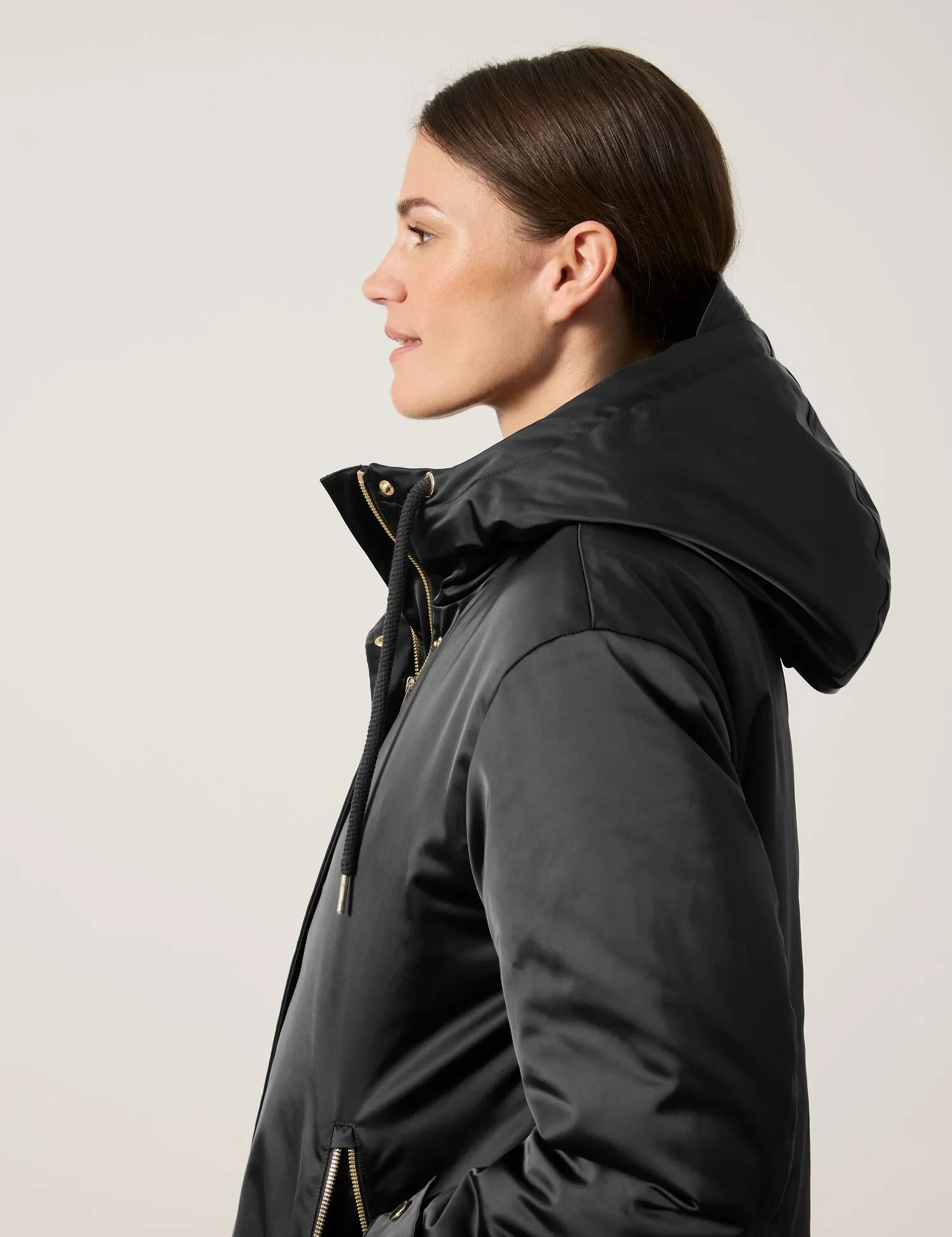 Outdoor coat with a quilted insert