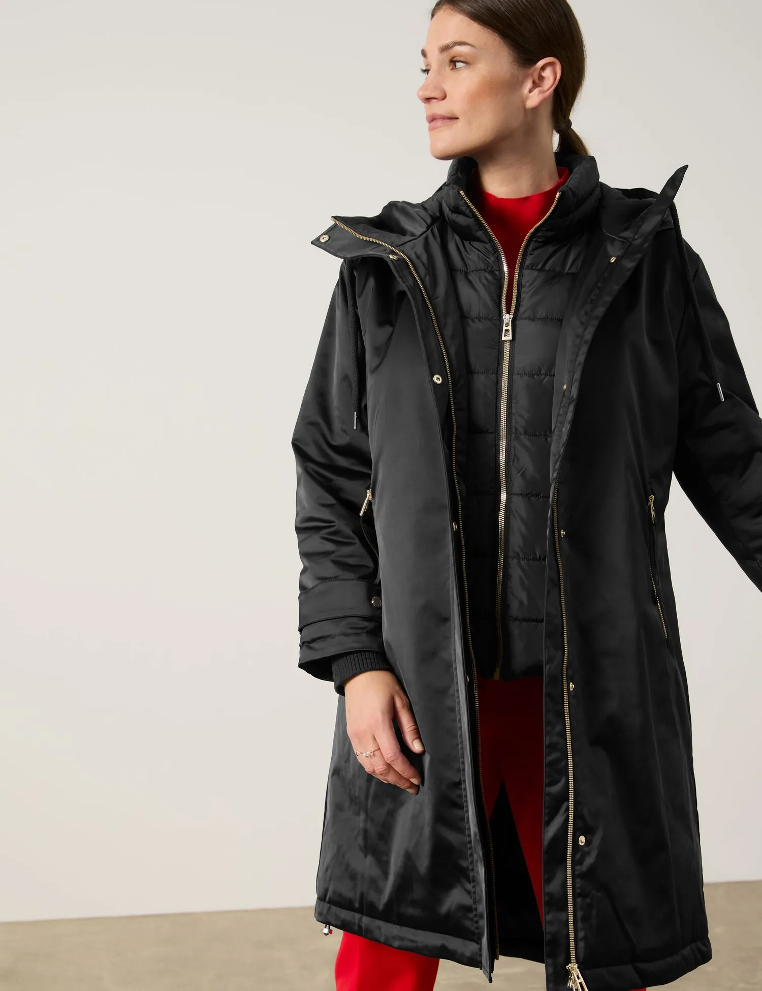 Outdoor coat with a quilted insert