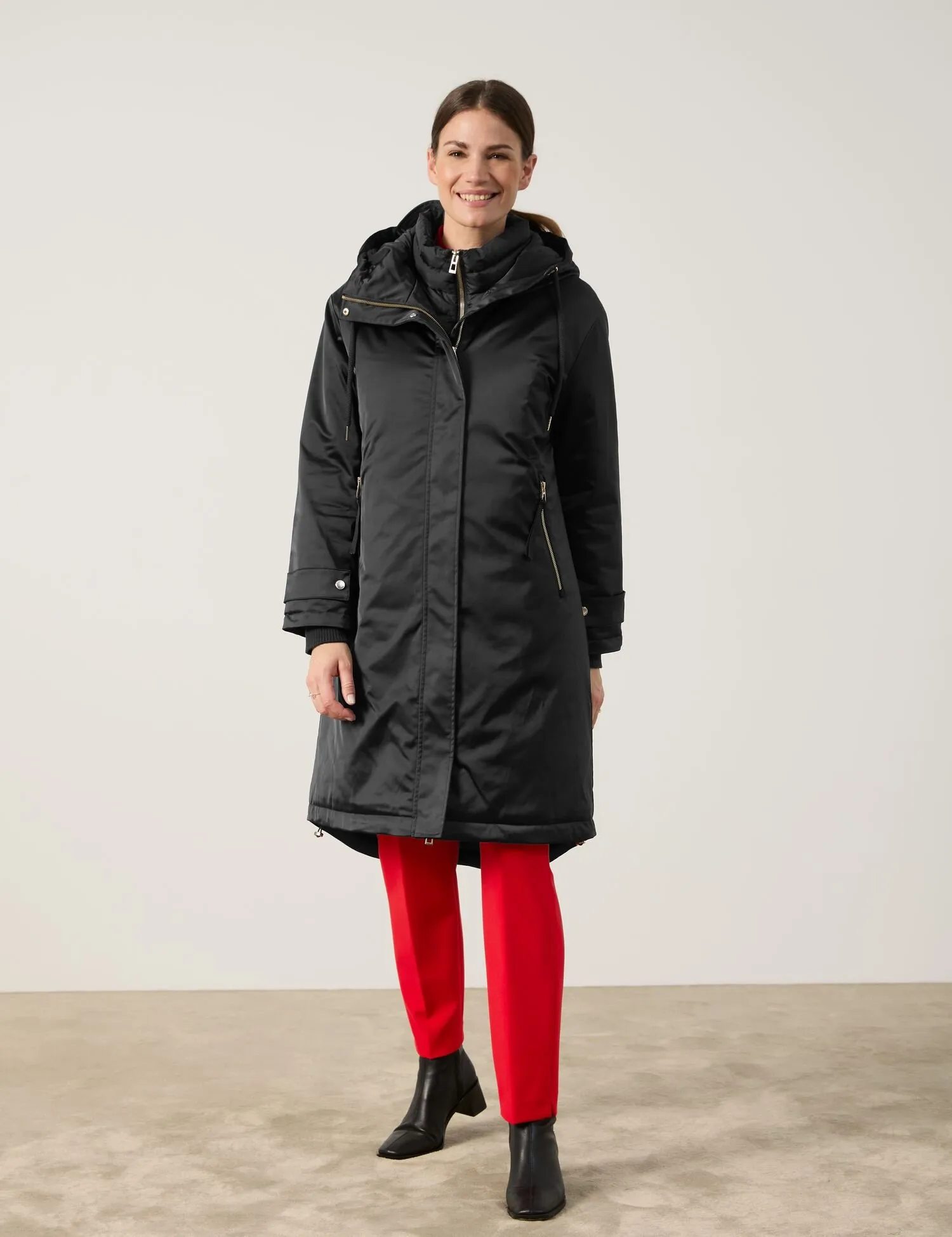 Outdoor coat with a quilted insert