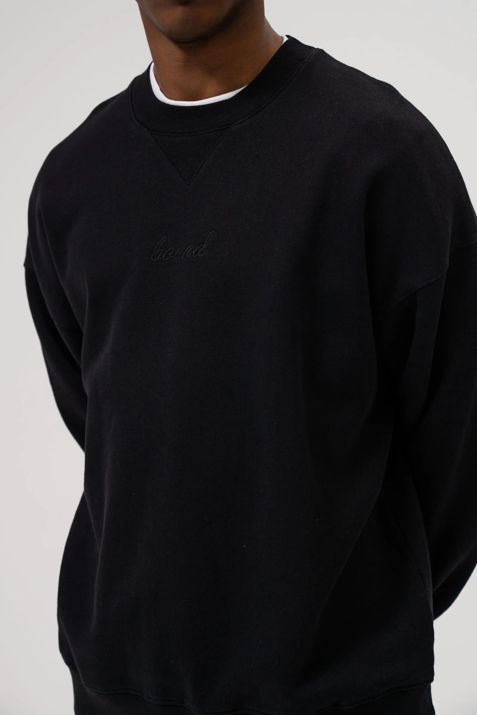 SUSTAIN BLACK SWEATER