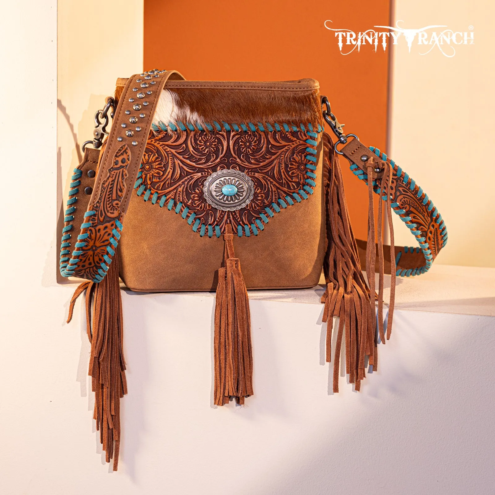 TR177G-9360  Trinity Ranch Hair-On Cowhide Floral Tooled  Concealed Carry Crossbody Bag - Brown