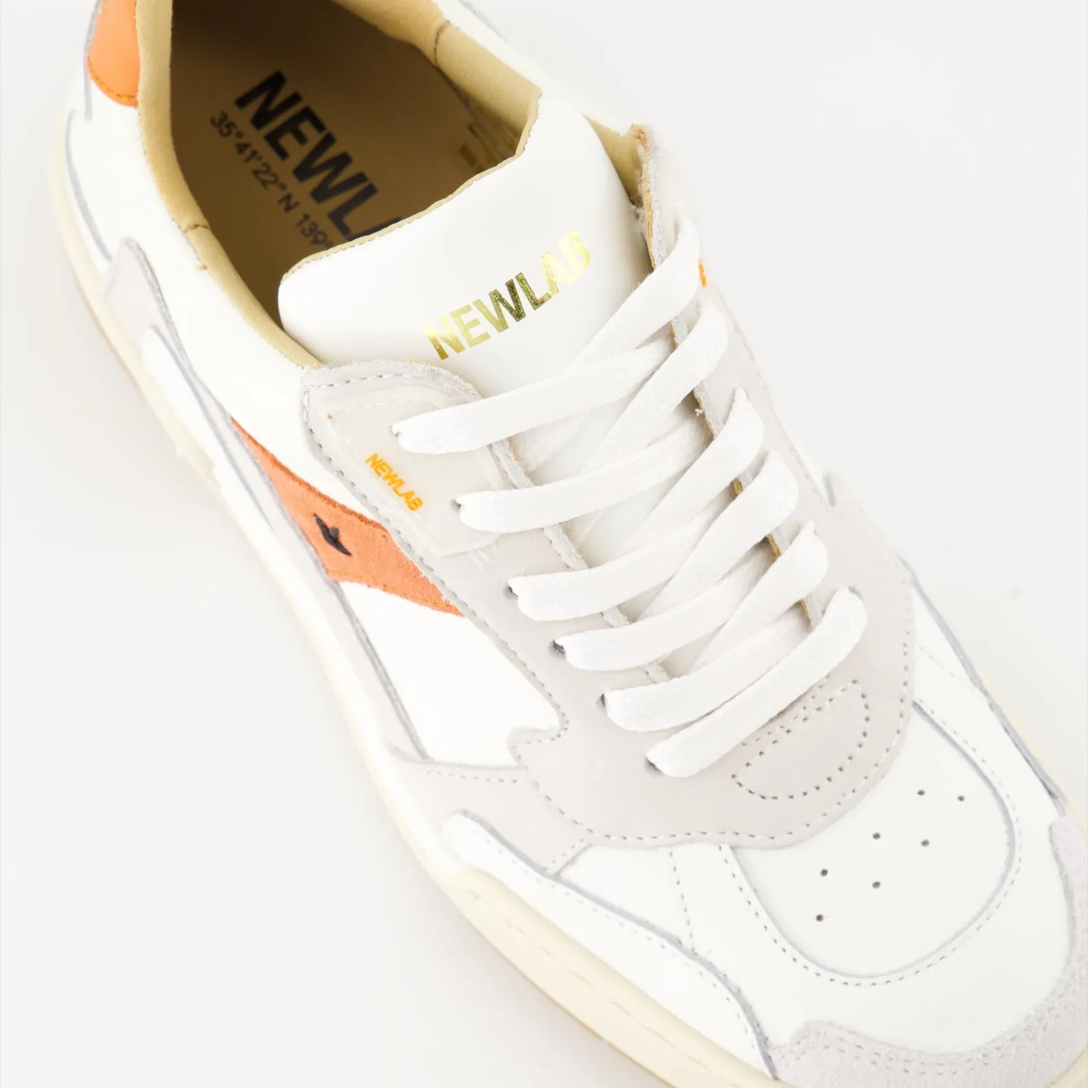 White and Orange Leather Sneakers