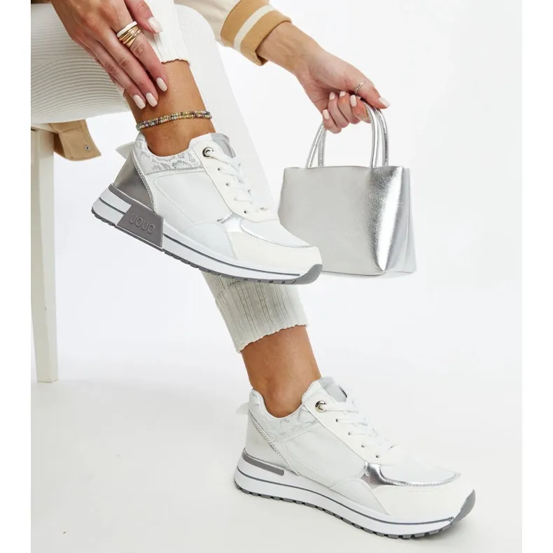 White sneakers on the Kerttu platform