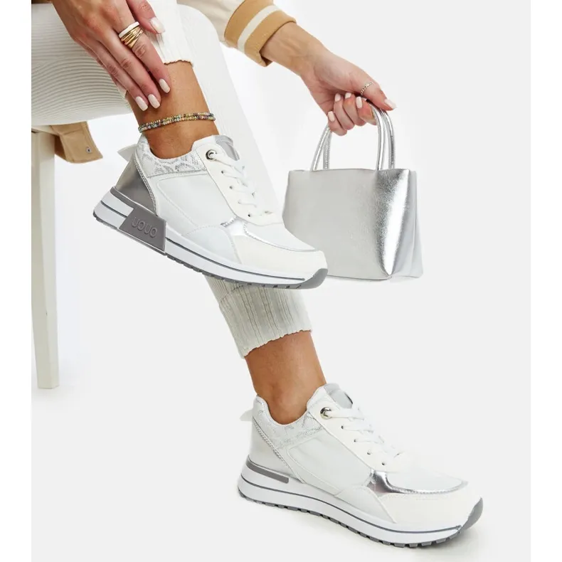 White sneakers on the Kerttu platform